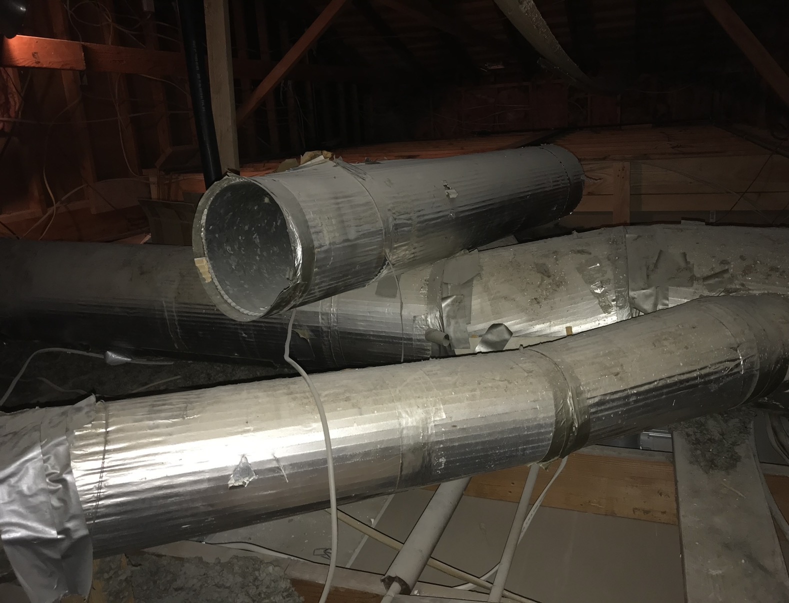 Weathered exterior building materials inspected during asbestos testing Weathered exterior building materials inspected during asbestos testing